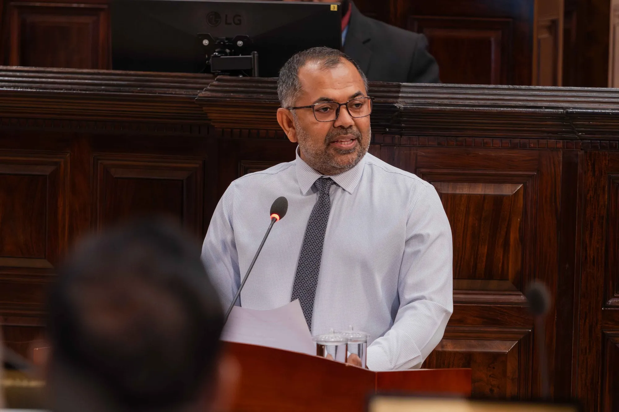 Minister of Finance and Planning Moosa Zameer presenting the proposed budget to Parliament (Photo/Parliament)