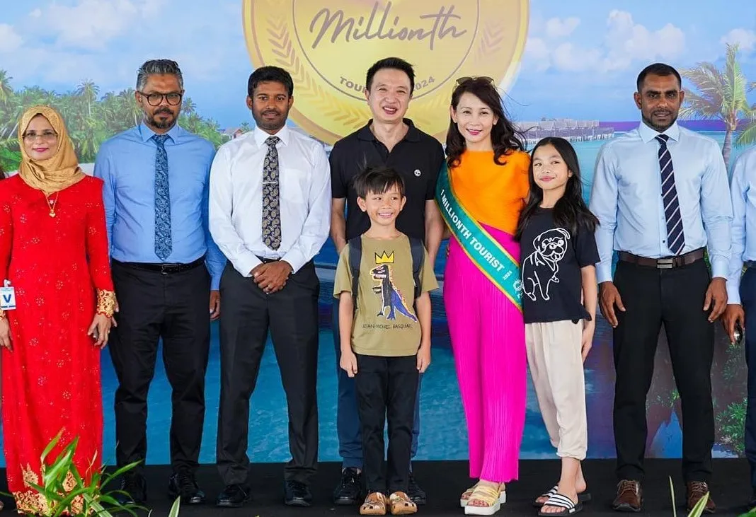 One millionth tourist and her family along with officials from MMPRC and tourism ministry (Photo/Voice)