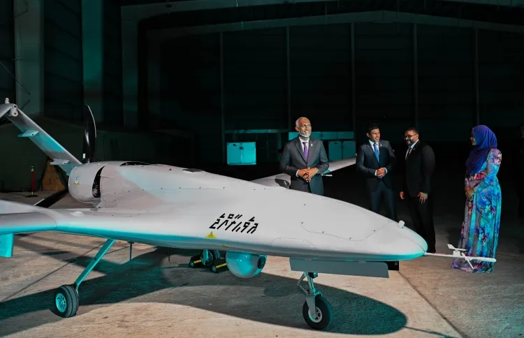 President Muizzu, First Lady Sajidha, Vice President Hussain and Minister of Defense Ghassan standing next to the drone after launching ceremony of Maldives first military drone (Photo/President's office)