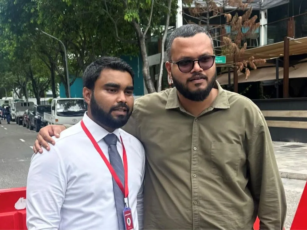 Adhadhu journalists Shahuzaan (L) and Leevan (R)