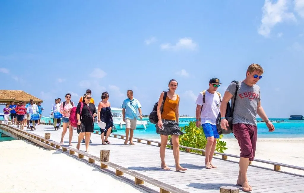 Tourists arrive at a resort in Maldives
